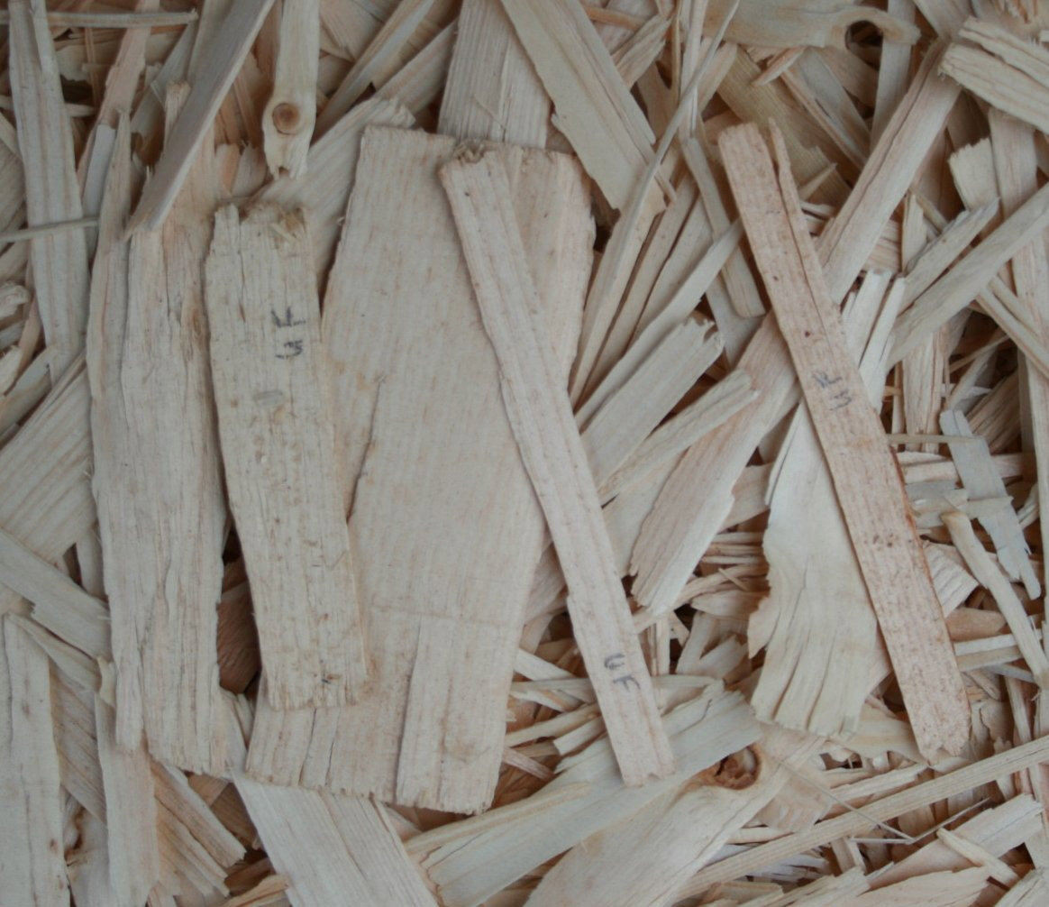 Holzpartikel mit verschiedenen unsichtbaren Klebstoffaufträgen Holzpartikel Spektroskopie